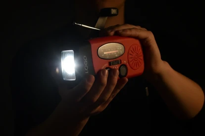 Custom emergency radio with LED flashlight, solar panel, and hand crank – ideal for hospital emergency preparedness kits