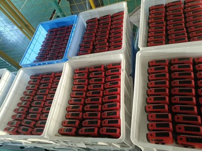 Close-up of solar-powered hand crank emergency radio showing LED flashlight and control dials